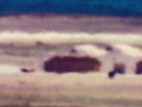 Canyons and Unidentified Vehicle/Tonopah Test Range, NV/Distance ~18 miles/12:45 pm